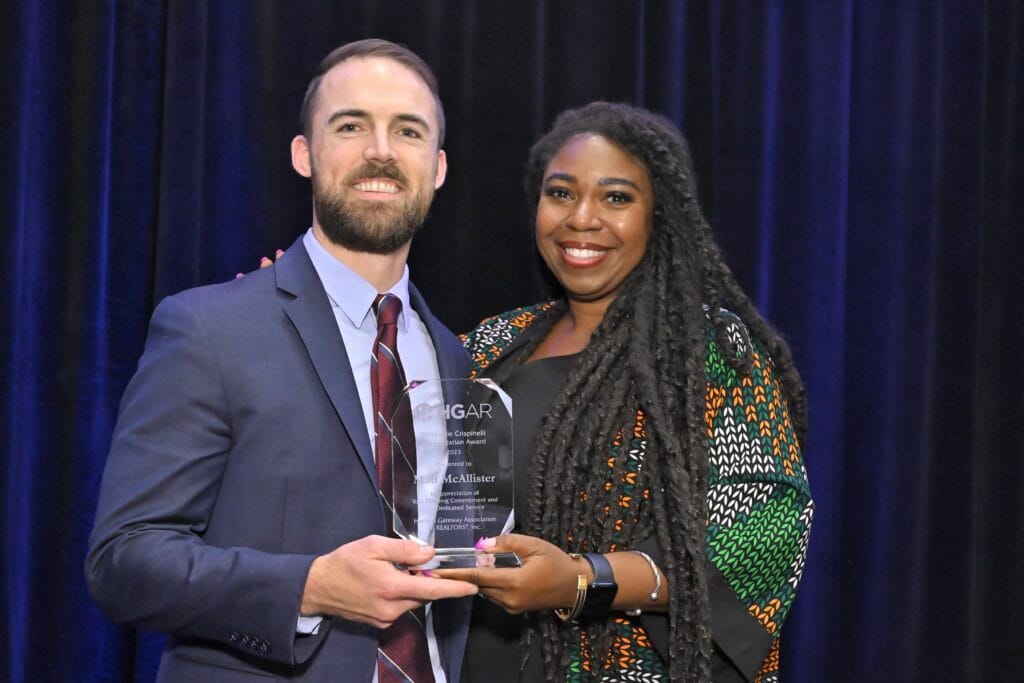 Matt McAllister, left, honored with HGAR’s “Stephanie Crispinelli Humanitarian Award” and Crystal Hawkins-Syska, HGAR Recognition Committee Chair.