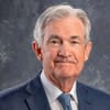 Fed Lowers Interest Rate a Quarter Point and Hints of More Cuts in 2025